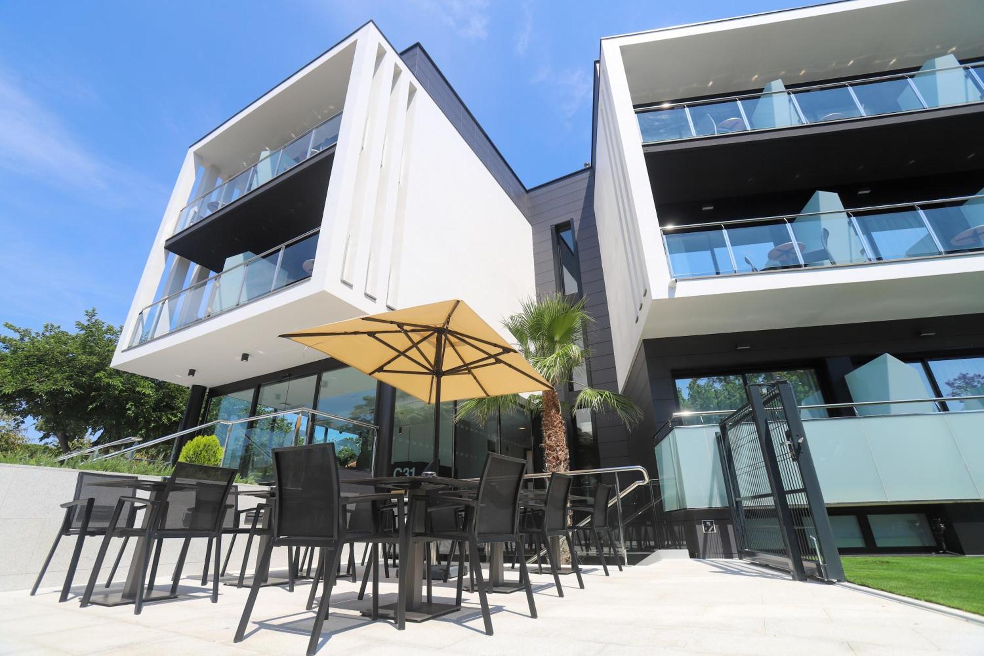 Hotel C31 Castelldefels Bagian luar foto